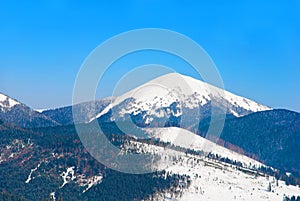 Snowy peak of Mount Hoverla, highest Ukraine mountain, Carpathian Mountains