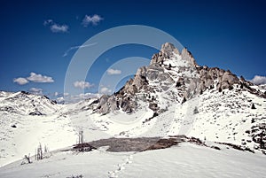 Snowy peaks of a mountain