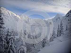 The snowy peaks of the Tatra Mountains rise high above the halls