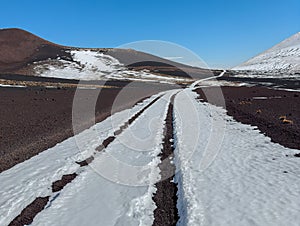 Snowy road through the La Payunia Provincial Reserve