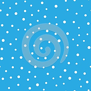 Snowy seamless patern. White dot snowflakes on blue background. Snow and Christmas theme. Abstract backround