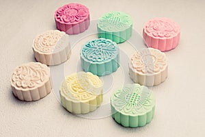 Snowy skin mooncakes. Chinese mid autumn festival foods. Traditional mooncakes on table