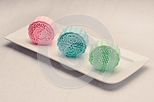 Snowy skin mooncakes. Chinese mid autumn festival foods. Traditional mooncakes on table