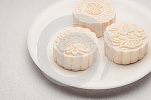 Snowy skin mooncakes. Chinese mid autumn festival foods. Traditional mooncakes on table