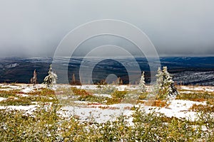 Snowy subarctic scene of Ogilvie Mountains YT Canada photo