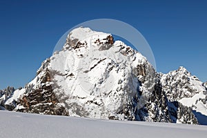 Snowy summit of the mountain Grosser Mythen on a winter day in Central Switzerland