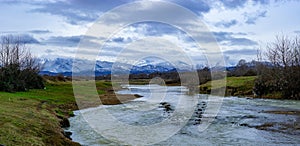 Snowy Talysh mountains, greens and Lankaran river in Azerbaijan