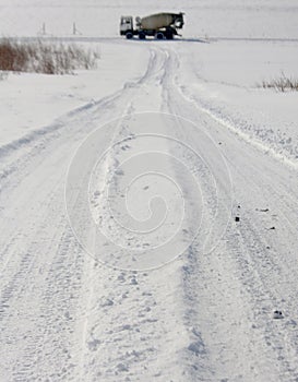 Snowy tracks with cement mixer