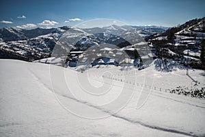 Snowy village in the courel range photo