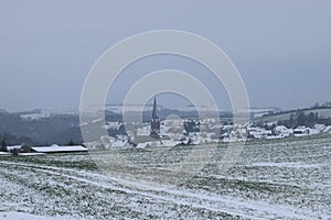 snowy village Welling in the valley photo