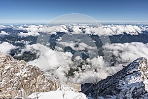 Snowy white Alpine mountain range in summer time on Zugspitze, top of Germany