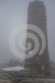 Snowy wind and fog on Maroma peak in thunderstorm day