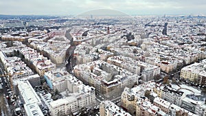 Snowy winter Berlin Snow roofs Cloudy sky. Stunning aerial top view flight drone