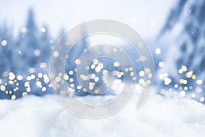 Snowy winter christmas bokeh background with lights and trees