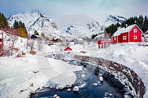 Snowy winter cityscape of Nusfjord town. Fabulous landscape of Norway, Europe.