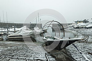 A snowy winter day in a small Como Lake village