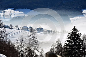 Snowy winter landscape with farmhouses at Attersee, Austria, Europe
