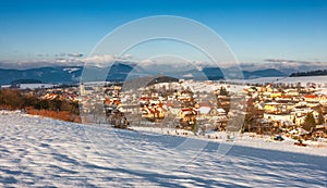 Snowy winter landscape with Rosina village near Zilina town.