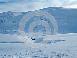 Snowy winter landscape of Sarek national park in swedish lappland