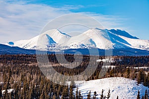 Snowy winter mountain landscape Yukon YT Canada