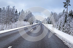 Snowy winter road in the south of Sweden