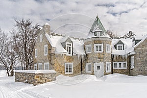 Snowy Winter scene stone house