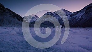 Snowy winter scene at twilight in Chugach State Park, Alaska