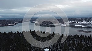 Snowy winter time scene of Oakland bay in the Pacific Northwest