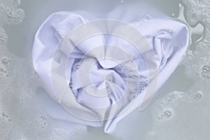 Soak a cloth before washing, white cloth, Heart shape