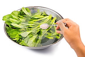 Soak vegetable in water with salt to remove pesticides residues