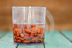 Soaked almonds ready for making almond milk in blender photo