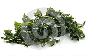 Soaked wakame seaweed on white background