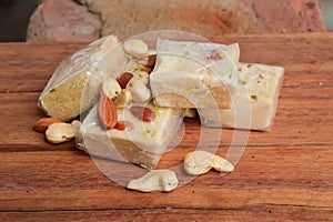 soan papdi top view on Wooden table photo