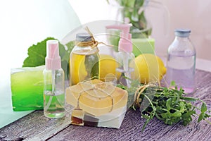 Soap, antiseptic liquid, plants, aromatic oil for hygienic procedures on the table