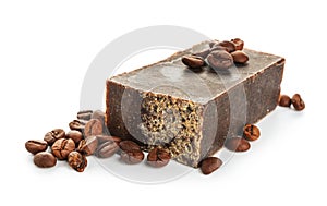 Soap bar with coffee beans on white background