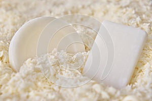 Soap bars on soap shavings photo