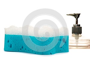 Soap and blue washcloth on a white background