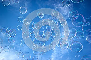 Soap bubble in the air with blue sky