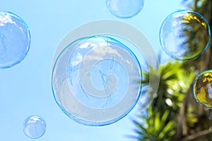 Soap Bubble With Light Blue Sky on Background. Concept Of Easiness, lightness And Aeriality. 3d rendering.