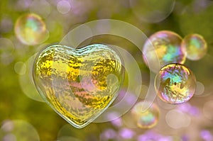 Soap bubble in the shape of heart