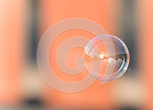 Soap bubble with sunset reflection