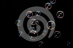 Soap bubbles on black background