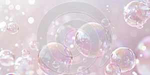 Soap bubbles floating on soft gradient background