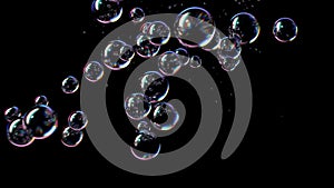 Soap Bubbles Fly Up and Burst on a Black Background. Beautiful Seamless Looped 3d Animation Ultra HD 4K 3840x2160