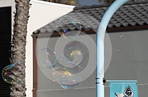 Soap bubbles in front of a h otel at Pacific Beach near Crystal Pier, San Diego