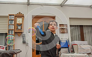 soap bubbles at home and a young boy playing