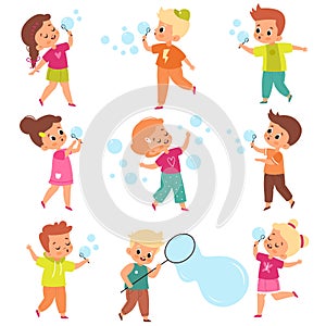 Soap bubbles show. Kids blow foam bubble, happy little girls and boys play, summer outdoor activity, fun children