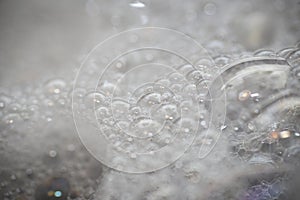 Soap bubbles on a sink - Abstract soap bubble background photo