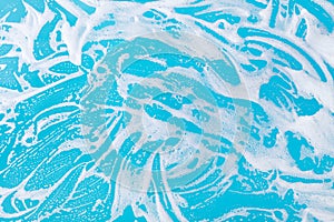 Soap foam on a blue background