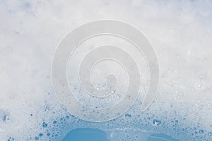 Soap foam with bubbles macro background